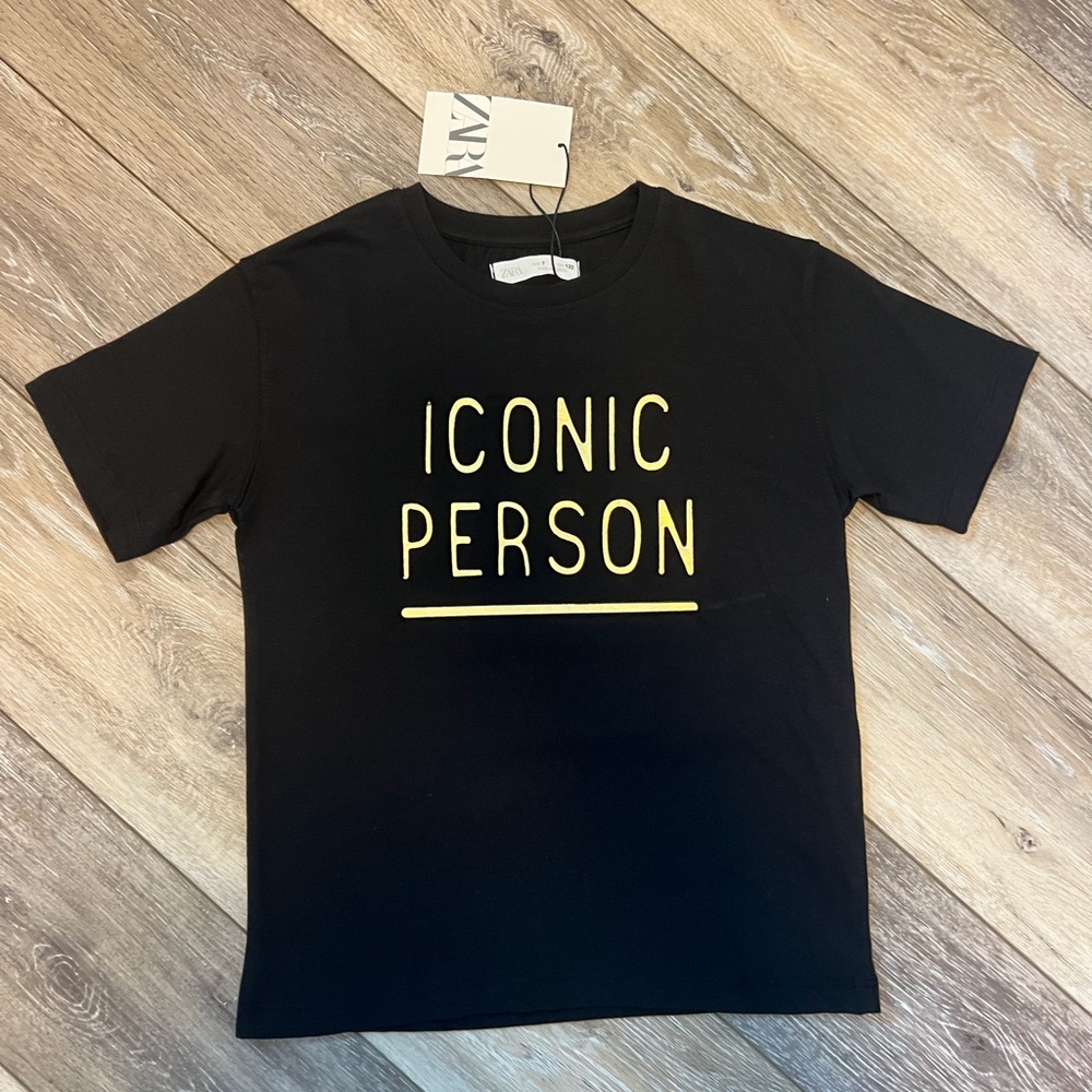 NWT Zara Black Tee with gold "ICONIC PERSON" Graphic size 7